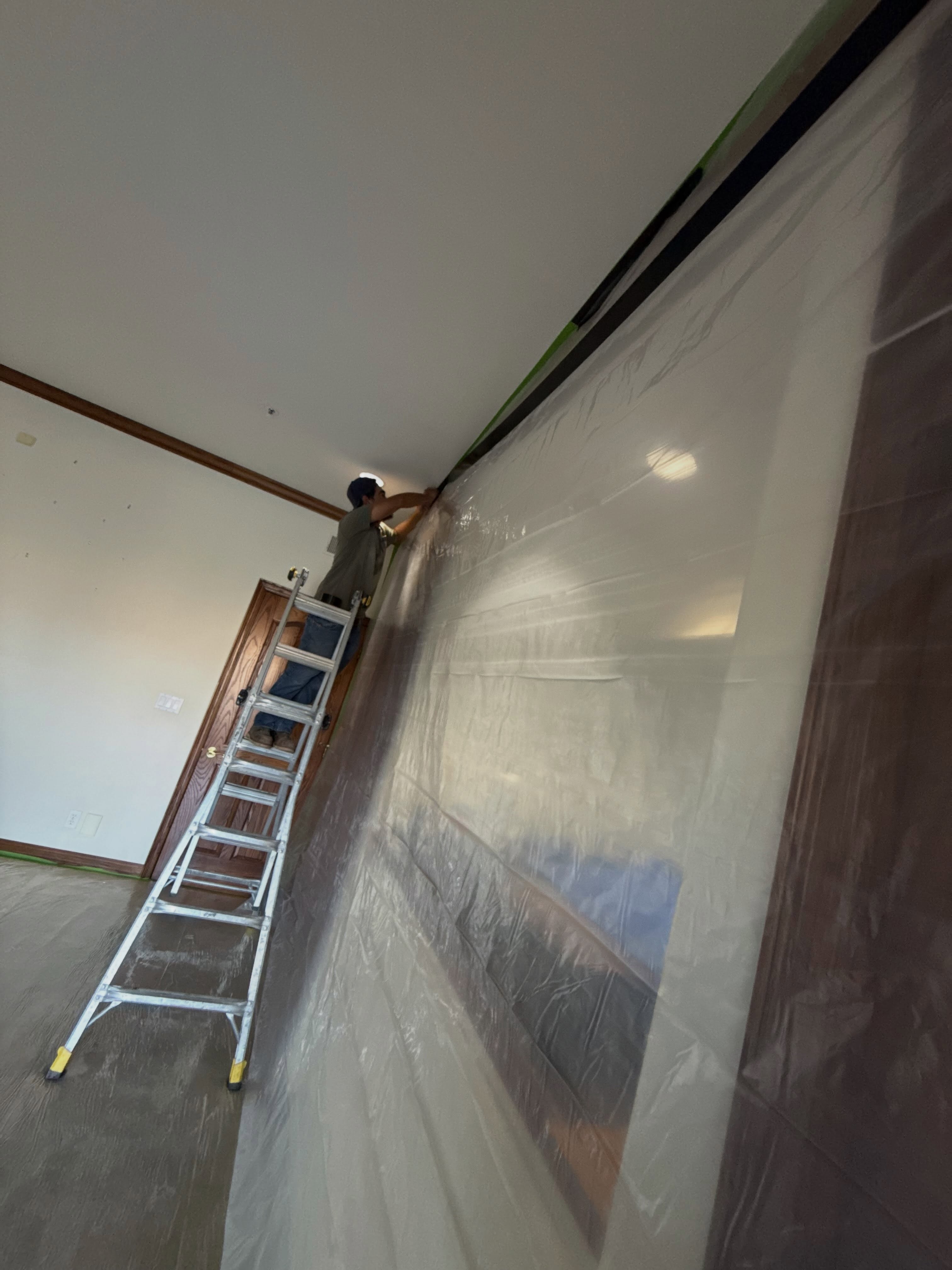 GT Demolition crew installing protective containment on a renovation job